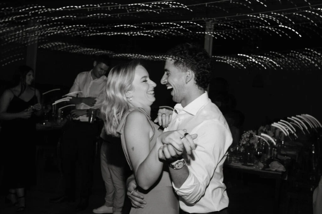 Shutter drag of couple dancing at wedding reception