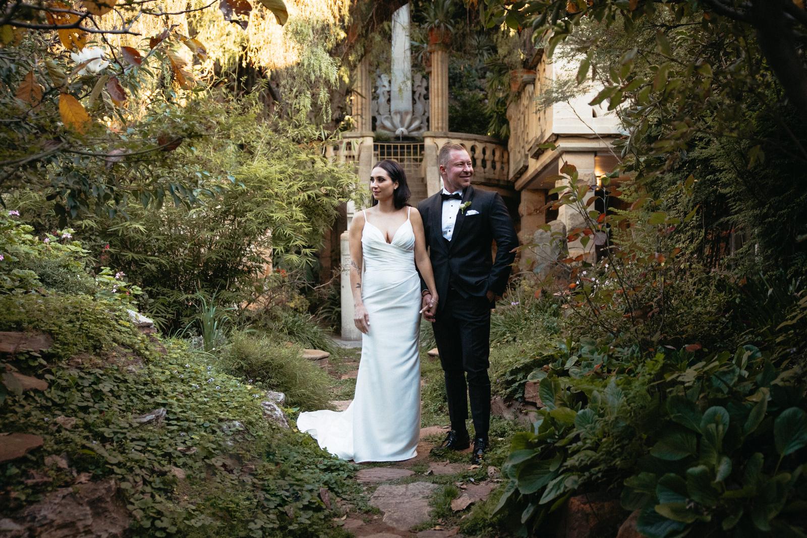 Wedding couple pose for photos in Shepstone gardens