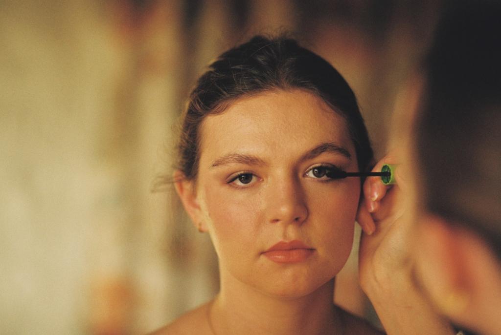 35mm film shot of a bride getting her makeup done