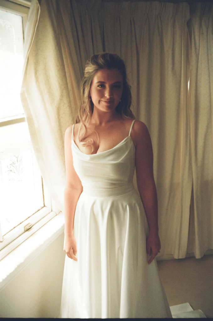 Bride in window light on 35mm