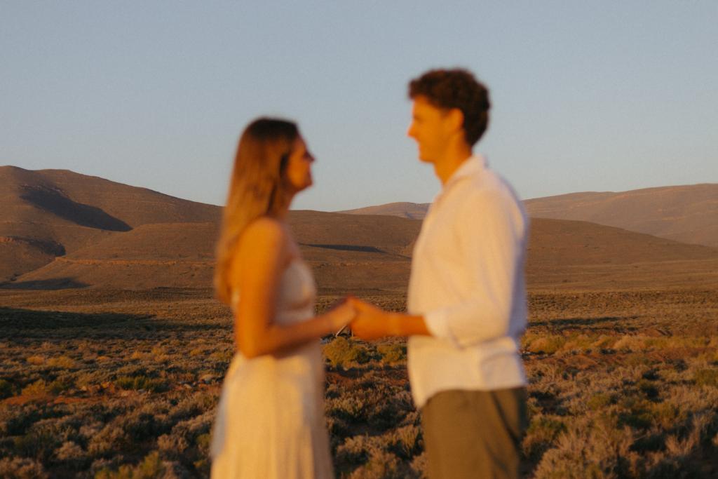 Blurred out wedding couple in the Karoo landscape