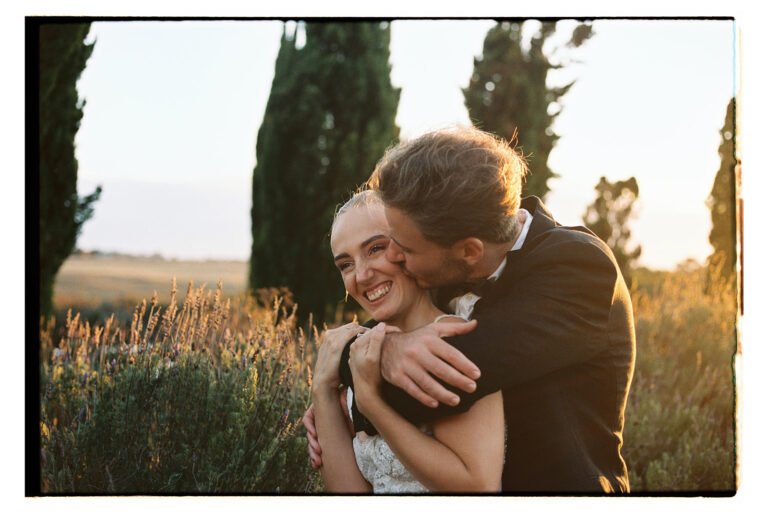 Wedding couple embracing in a lavender field