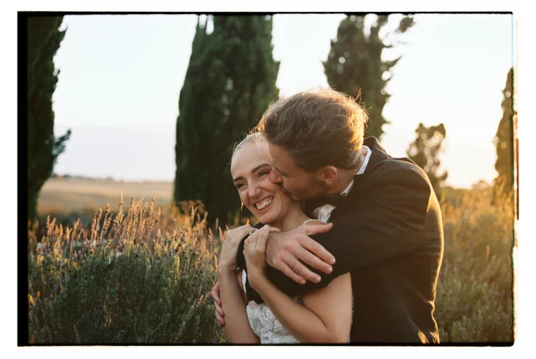 Wedding couple embracing in a lavender field