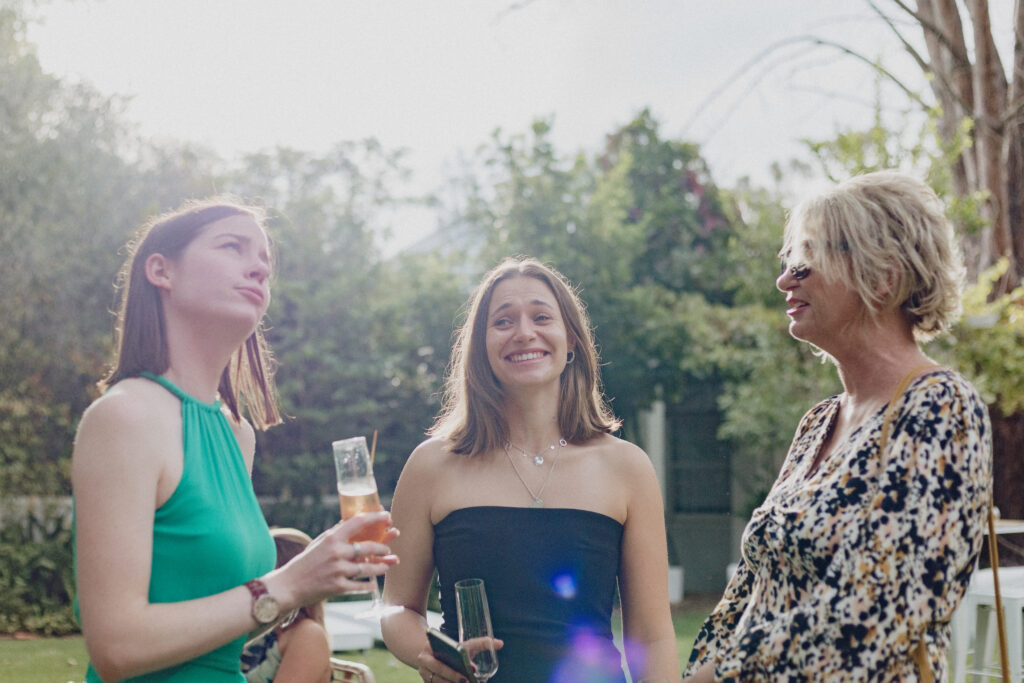 Candid photo of wedding guests during canapés 