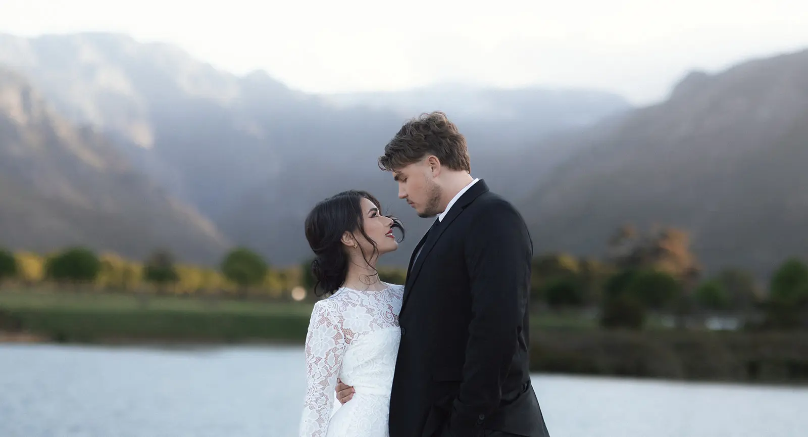Wedding photograph of the couple from La Roche estate with the Franschoek mountains in the background