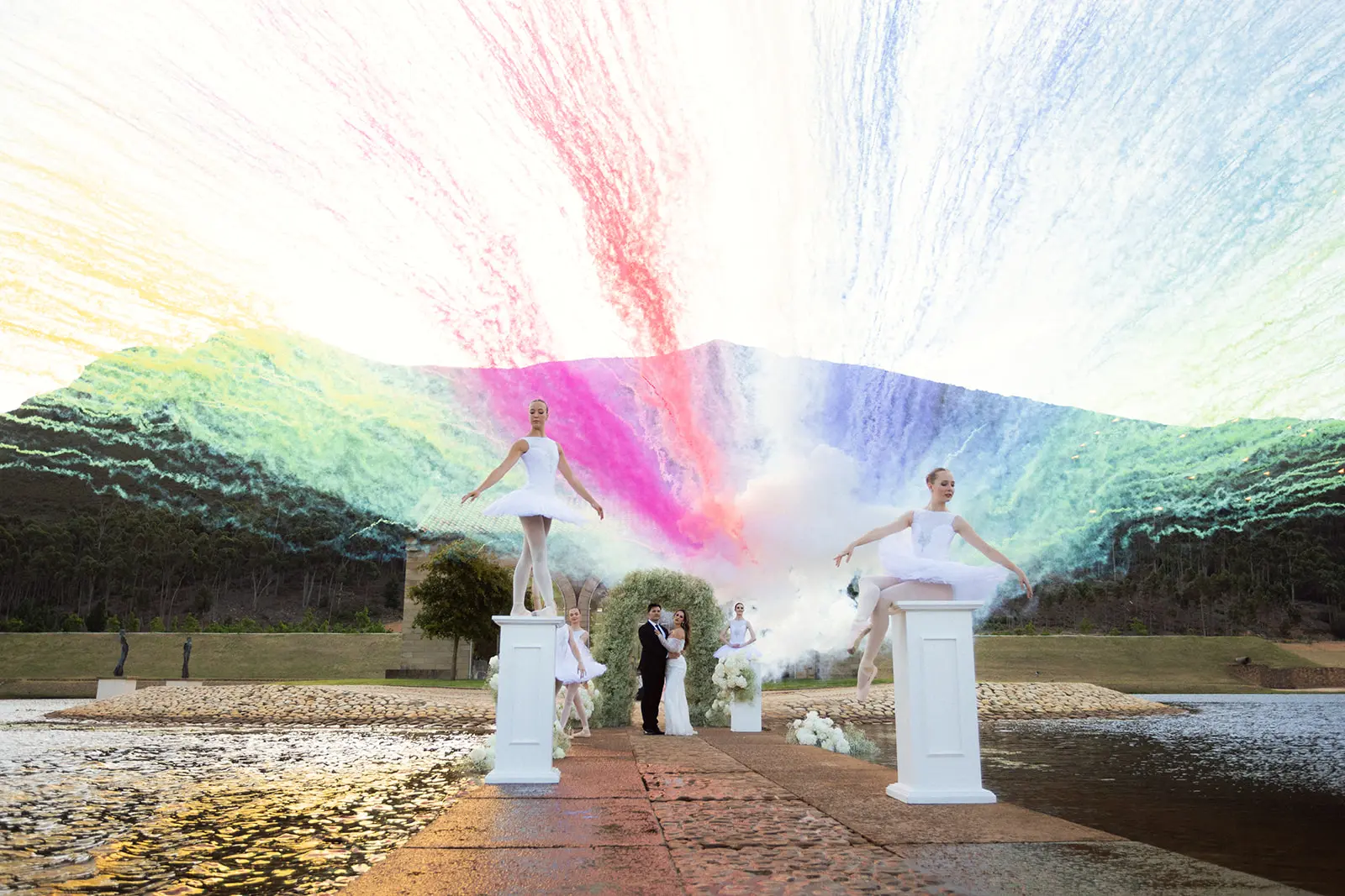 Wedding photography at La Roche estate of a ceremony with daytime fireworks in the background