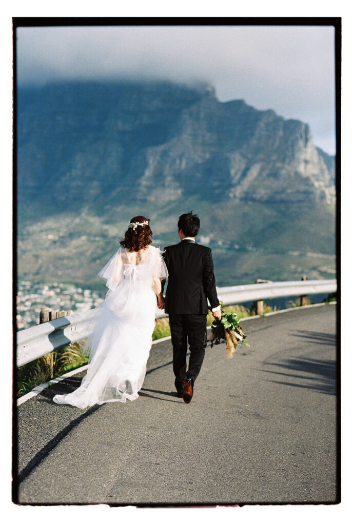 Couple photographed by Table Mountain in Cape Town