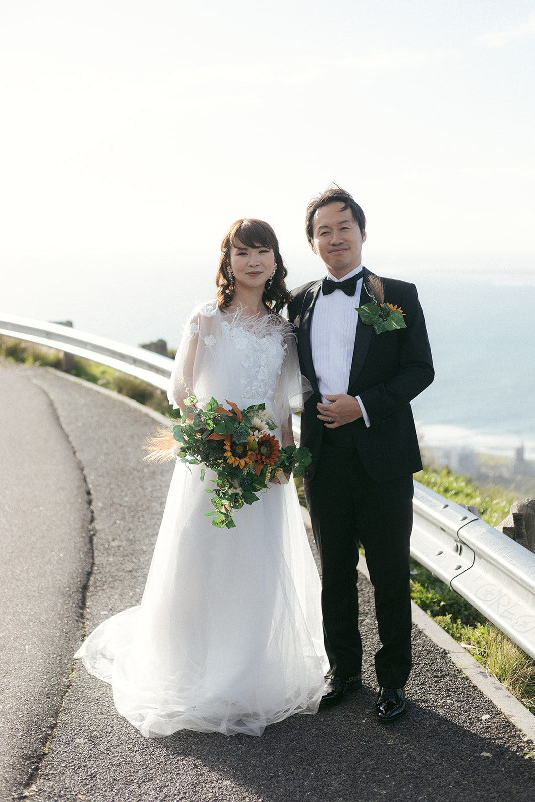 Elopement couple standing on the road