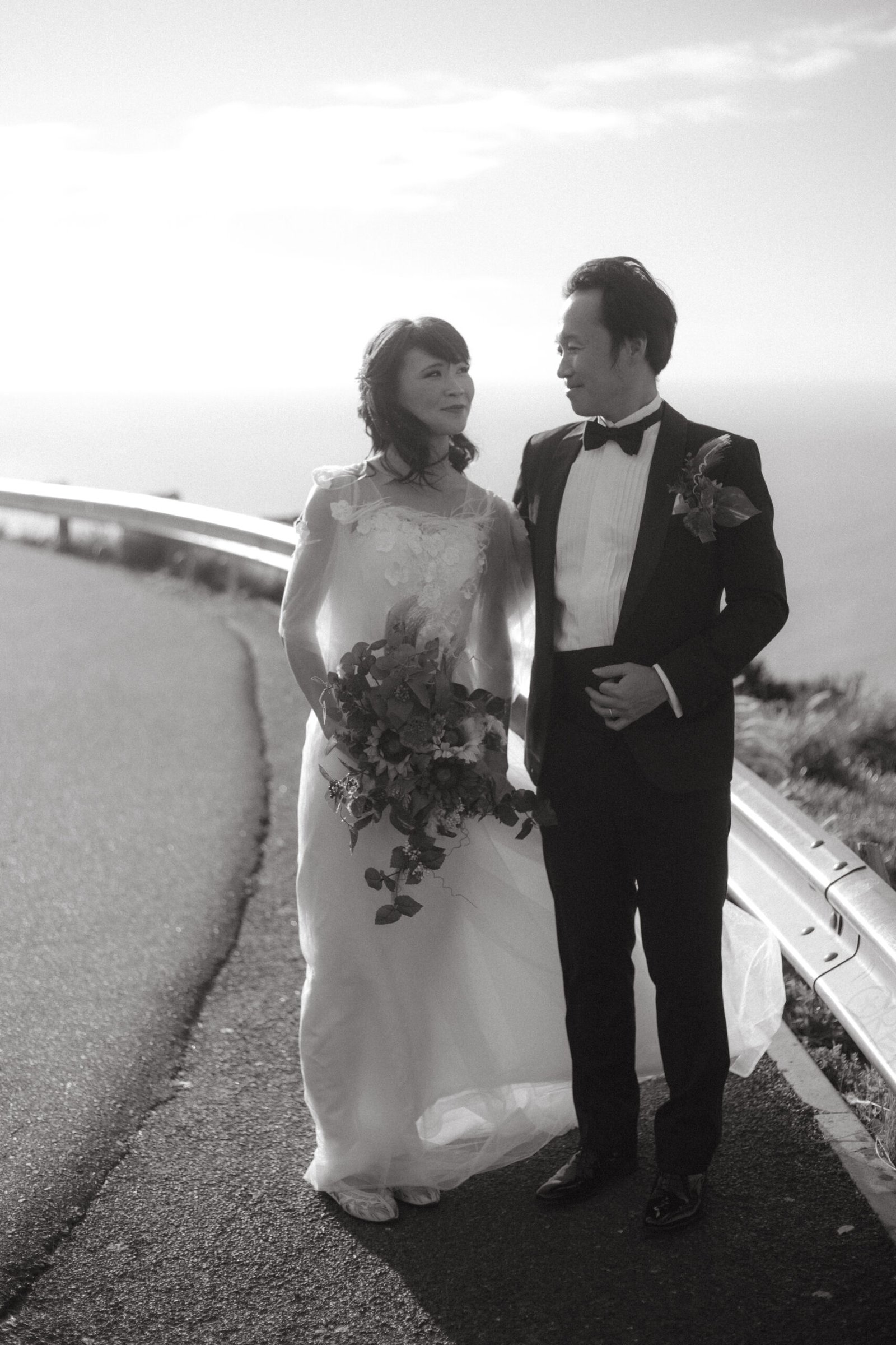 Black and white image of a wedding couple on signal hill