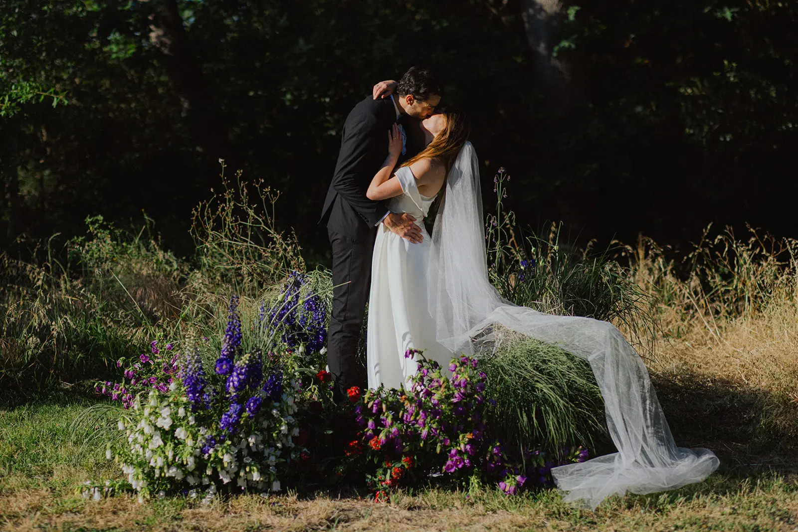 Wedding couple's first kiss at Plaisir