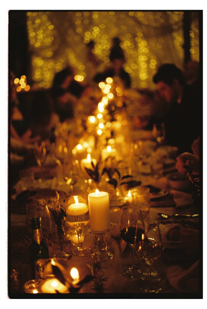 Wedding photography detail shot on film of candlelit table scape